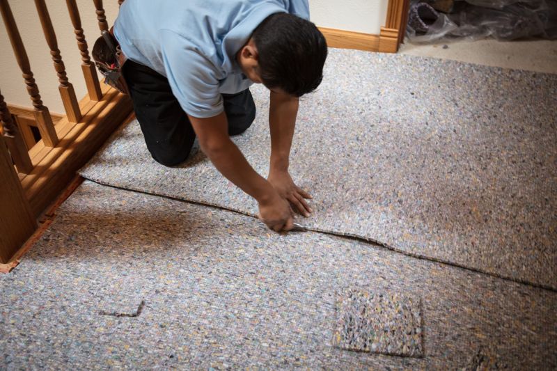 Expert Carpet Installer at Work